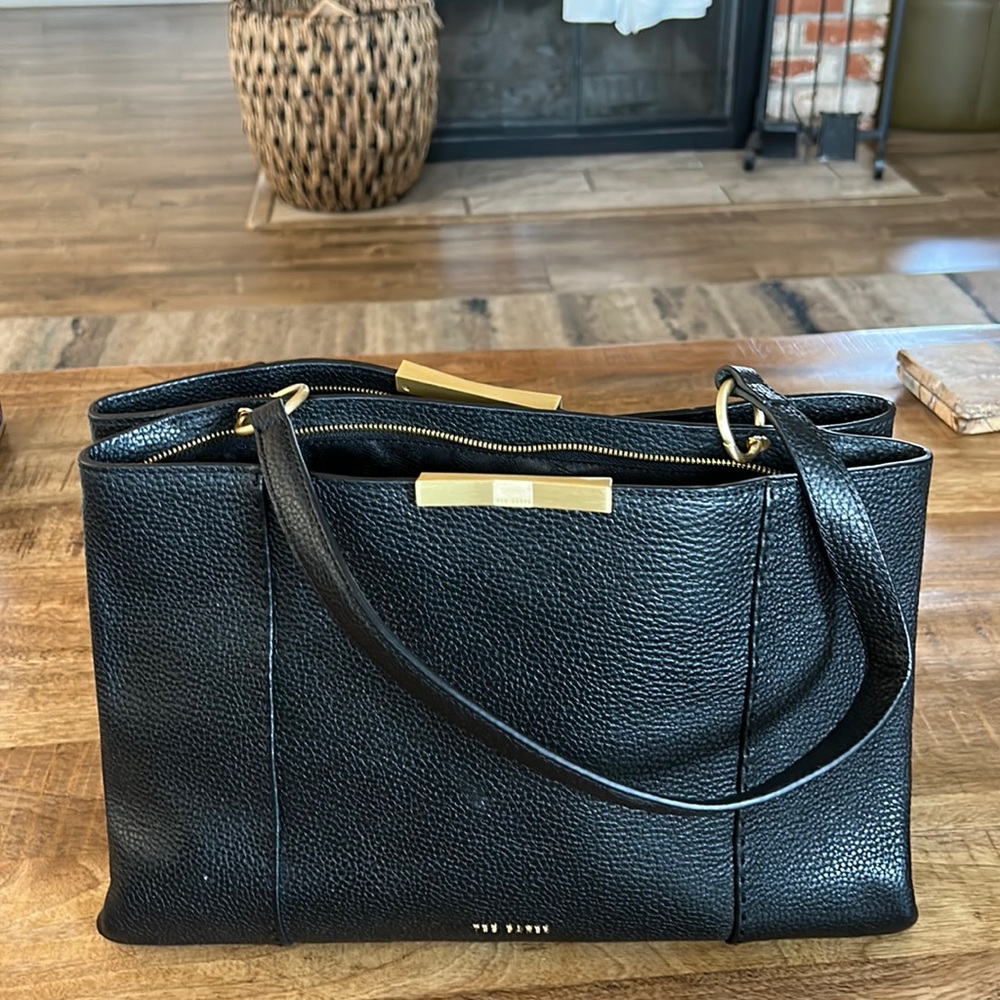 Ted Baker Tote with gold accents.  Excellent used condition. Dust bag included